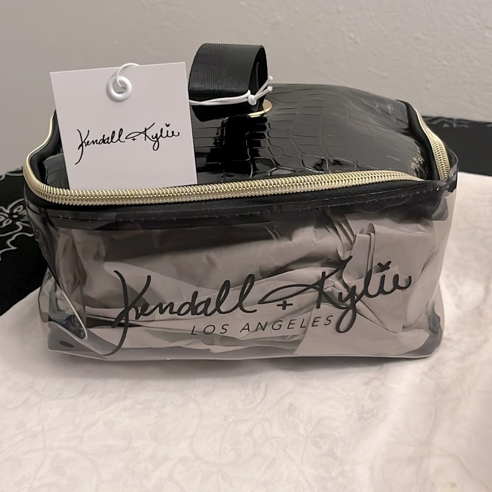 KENDALL & KYLIE: Smokey  black and gold makeup bag.